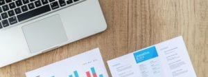 Laptop and CV on desk | The Career Academy Ireland